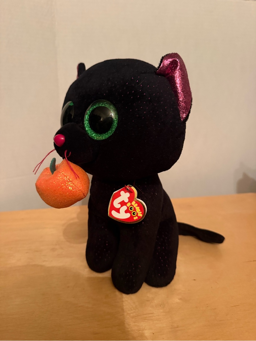 Ty Black Cat Plush with Green Eyes and Pink Ears Holding Orange Pumpkin